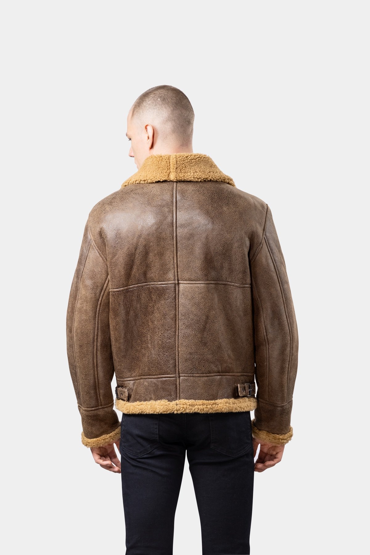 Shearling Leather Jacket - Brown Model wearing Mens Brown Shearling Leather Jacket from the back