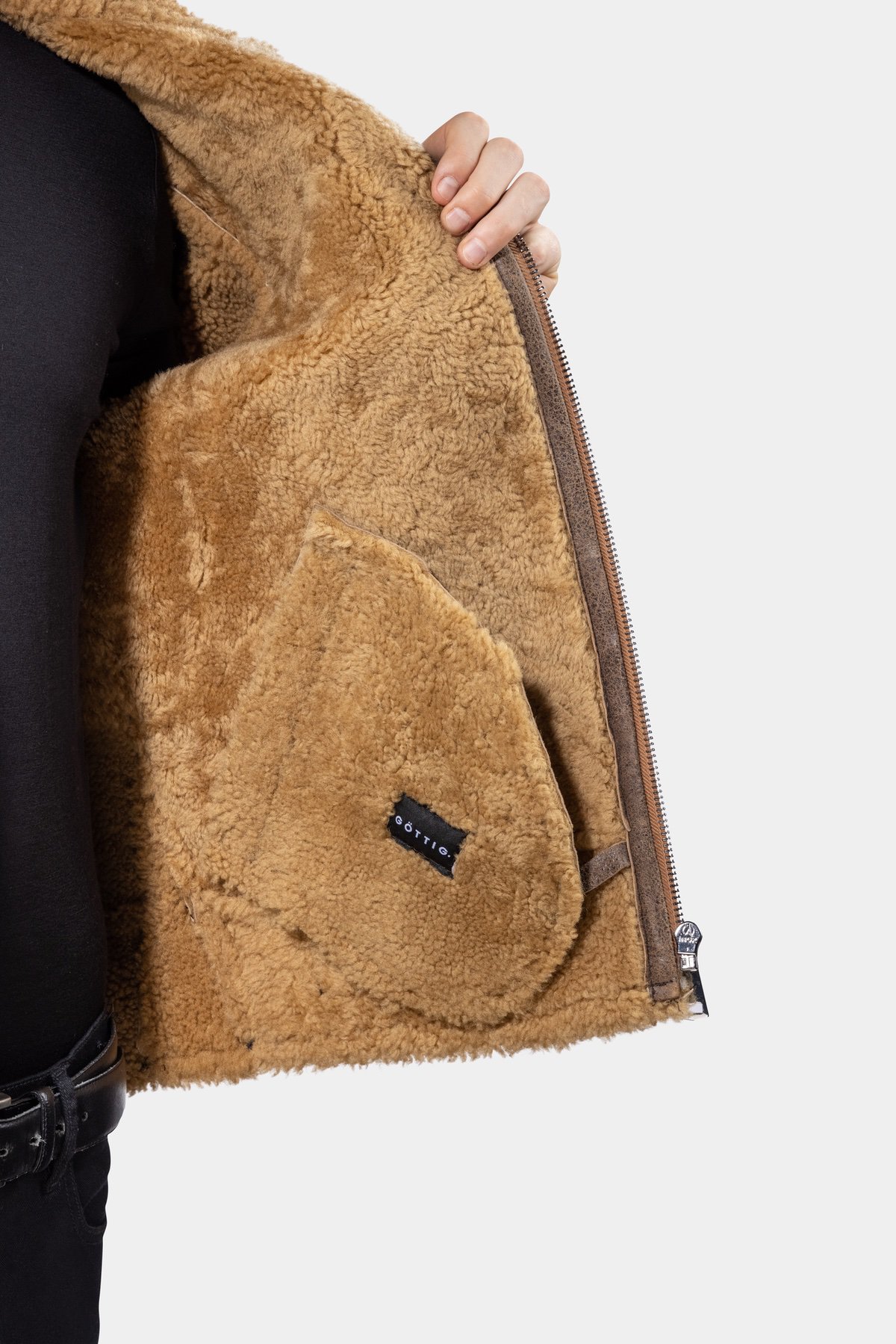 Shearling Leather Jacket - Brown Model wearing Mens Brown Shearling Leather Jacket presenting the interior