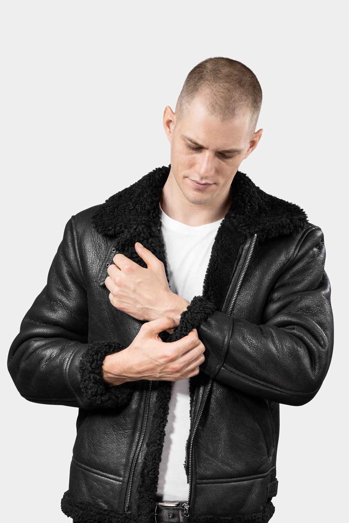 Model wearing Mens Black Shearling Leather Jacket presenting the sleeve
