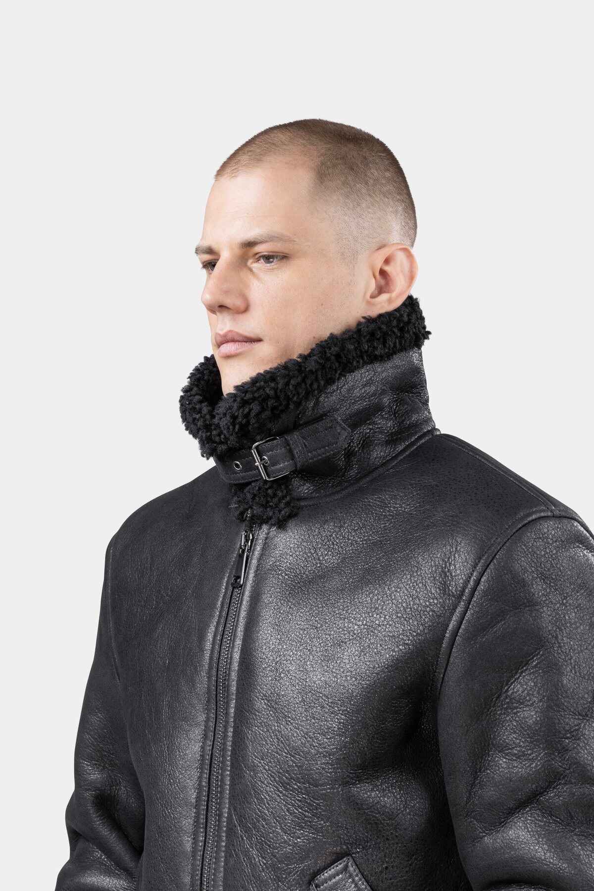 Model wearing Mens Black Shearling Leather Jacket presenting the collar
