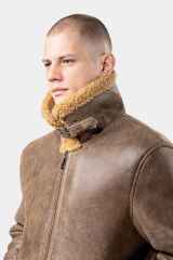 Model wearing Mens Brown Shearling Leather Jacket presenting the collar
