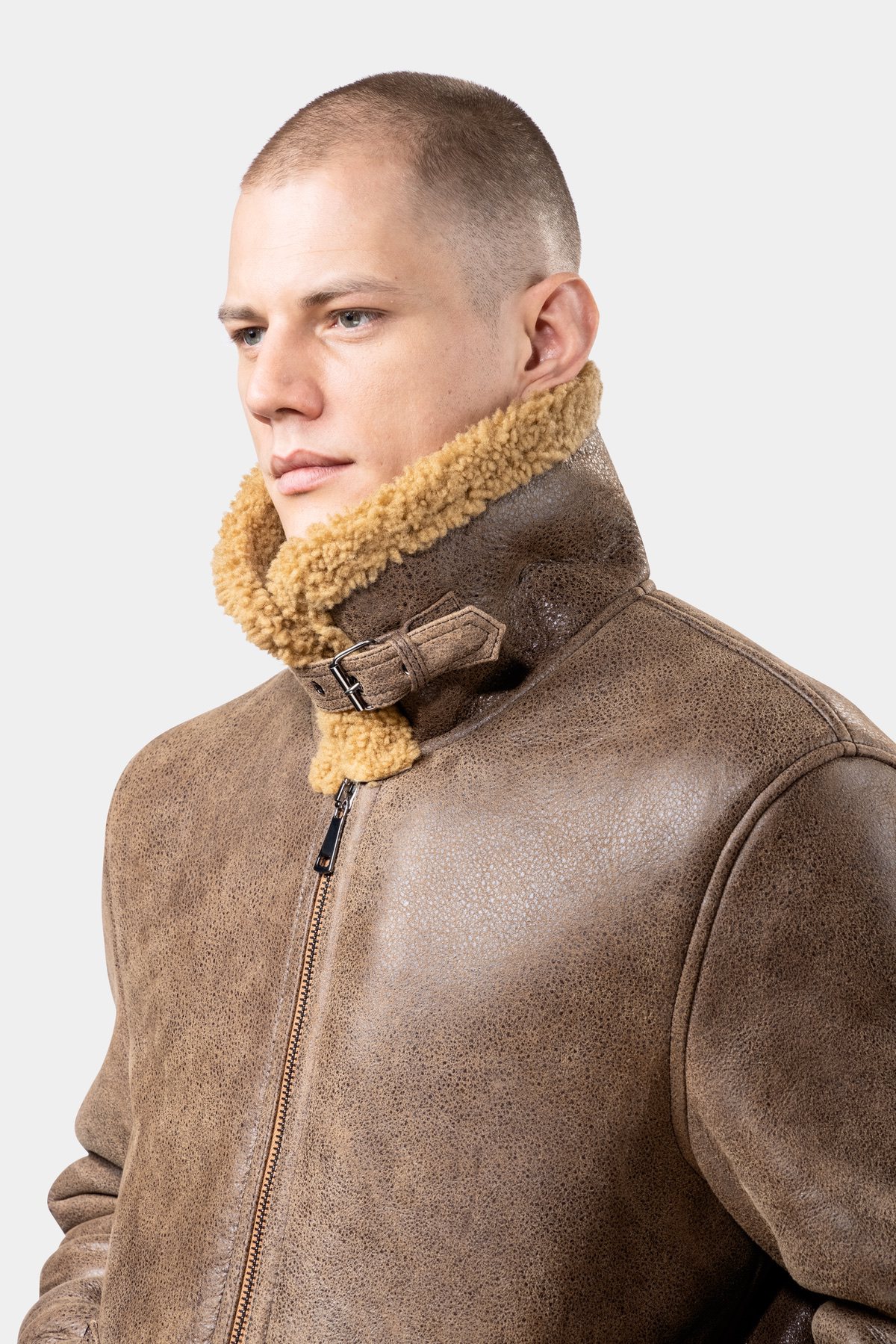 Shearling Leather Jacket - Brown Model wearing Mens Brown Shearling Leather Jacket presenting the collar