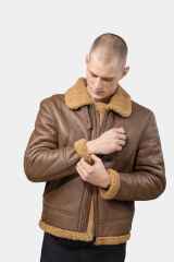 Model wearing Mens Camel Shearling Leather Jacket presenting the sleeve