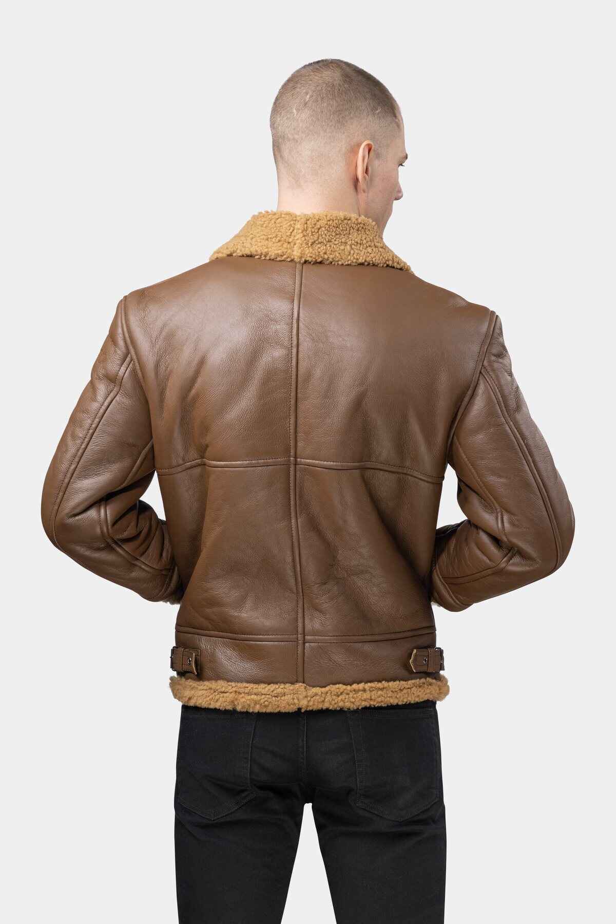Model wearing Mens Camel Shearling Leather Jacket from the back